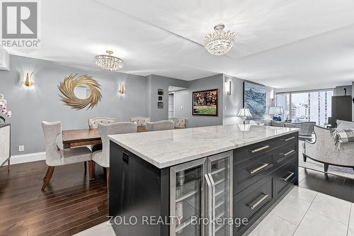 Island with bar fridge and customized drawers. - 1101 - 160 George Street, Ottawa, ON - Indoor