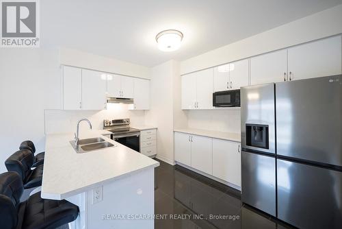 9 Tarrison Street, Brantford, ON - Indoor Photo Showing Kitchen With Stainless Steel Kitchen With Double Sink