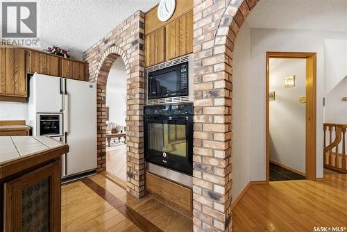 250 Prospect Crescent, Lumsden, SK - Indoor With Fireplace