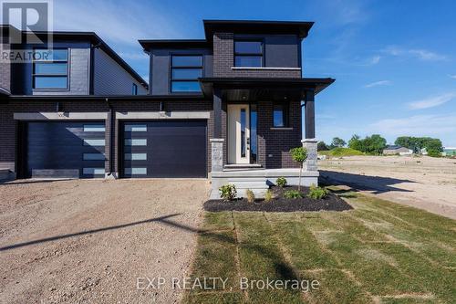 102 Thackeray Way, Minto, ON - Outdoor With Facade