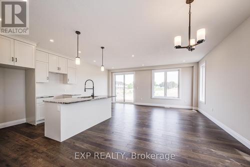 102 Thackeray Way, Minto, ON - Indoor Photo Showing Kitchen With Upgraded Kitchen