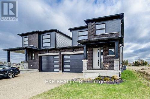 102 Thackeray Way, Minto, ON - Outdoor With Facade