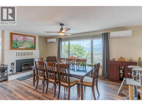 1418 Fairview Road, Oliver, BC - Indoor Photo Showing Dining Room With Fireplace
