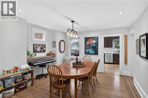 Dining room with wood finished floors and recessed lighting - 248 London Street S, Hamilton, ON - Indoor Photo Showing Dining Room