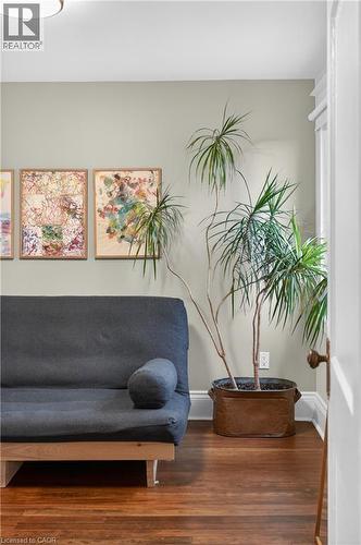 Sitting room featuring wood finished floors and baseboards - 248 London Street S, Hamilton, ON - Indoor