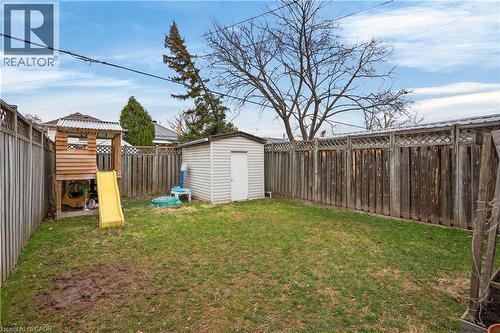 Fenced backyard featuring a shed - 248 London Street S, Hamilton, ON - Outdoor