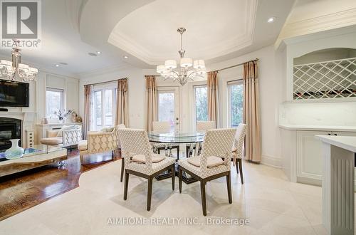 38 Pheasant Road, Toronto, ON - Indoor Photo Showing Dining Room With Fireplace