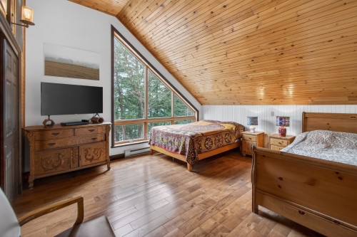 Chambre à coucher - 21 Ch. Paul-Grégoire, La Minerve, QC - Indoor Photo Showing Bedroom
