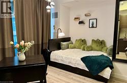 Bed area with vinyl finished floors - 