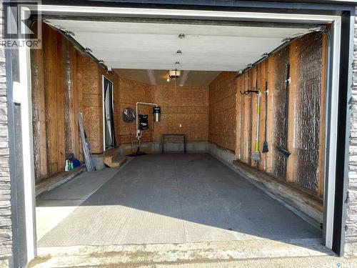 2 5301 Beacon Drive, Regina, SK - Indoor Photo Showing Garage