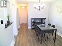 Dining room featuring wood finished floors and hanging lights - 1492 Sandgate Crescent Unit# Upper, Mississauga, ON  - Indoor Photo Showing Dining Room 