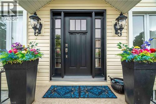 Shiny new Entry door with accenting sidelights. - 99 Argyle Street N, Caledonia, ON - Outdoor With Exterior