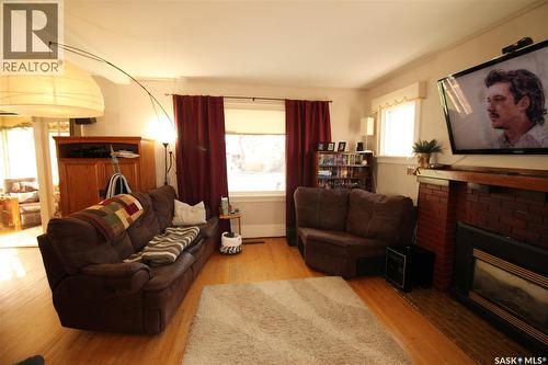 663 2Nd Street E, Shaunavon, SK - Indoor Photo Showing Living Room With Fireplace