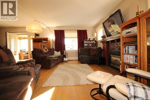 663 2Nd Street E, Shaunavon, SK - Indoor Photo Showing Living Room With Fireplace