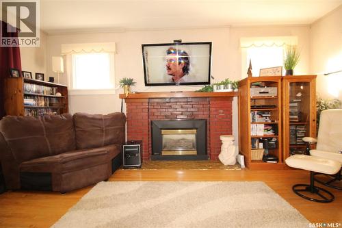 663 2Nd Street E, Shaunavon, SK - Indoor Photo Showing Living Room With Fireplace