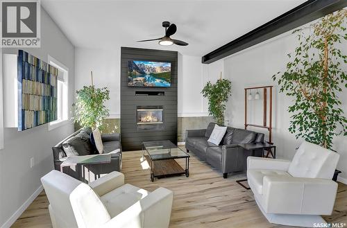 26 Alice Crescent, North Grove, SK - Indoor Photo Showing Living Room With Fireplace