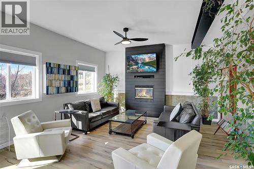 26 Alice Crescent, North Grove, SK - Indoor Photo Showing Living Room With Fireplace