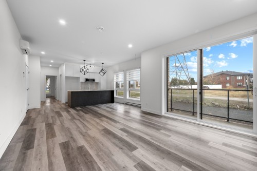 Vue d'ensemble - 101-965 Rue Brébeuf, Sainte-Catherine, QC - Indoor Photo Showing Living Room