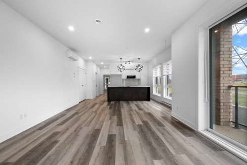 Vue d'ensemble - 101-965 Rue Brébeuf, Sainte-Catherine, QC - Indoor Photo Showing Other Room