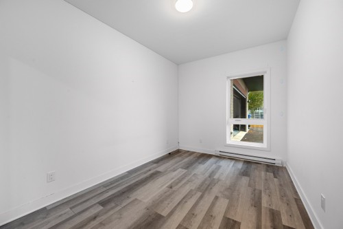 Chambre à coucher principale - 101-965 Rue Brébeuf, Sainte-Catherine, QC - Indoor Photo Showing Other Room