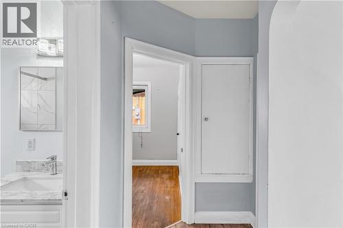 Hall with a sink and light wood-type flooring - 41 Floral Crescent, Kitchener, ON - Indoor Photo Showing Other Room