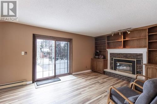 7 Golf Range Cres, Sault Ste. Marie, ON - Indoor Photo Showing Living Room With Fireplace