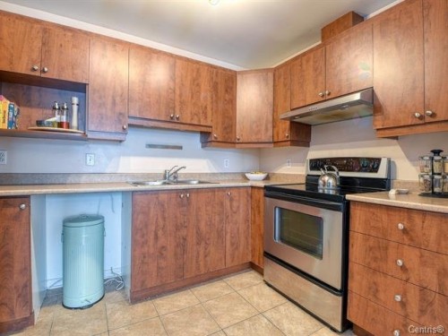Cuisine - 102-2964 Rue Montcalm, Vaudreuil-Dorion, QC - Indoor Photo Showing Kitchen With Double Sink