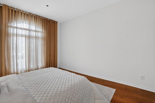 Chambre à coucher principale - 105-275 Rue Upper Edison, Saint-Lambert, QC - Indoor Photo Showing Bedroom