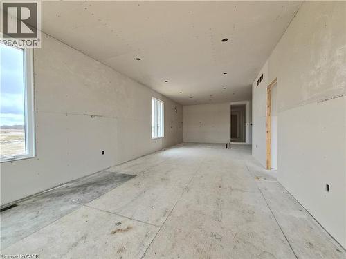 View of empty room - 106 Thackeray Way, Harriston, ON - Indoor Photo Showing Other Room