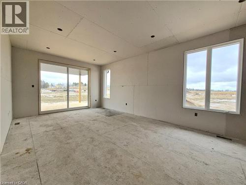 Spare room with plenty of natural light - 106 Thackeray Way, Harriston, ON - Indoor Photo Showing Other Room