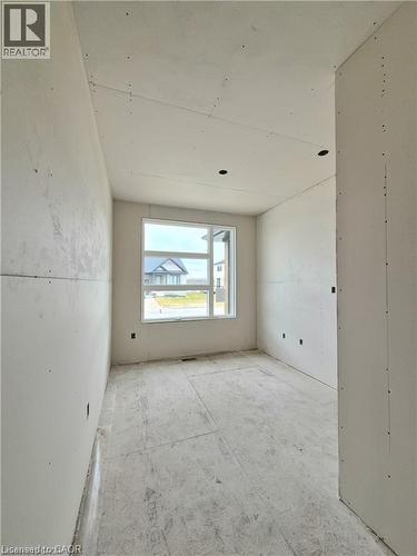 View of empty room - 106 Thackeray Way, Harriston, ON - Indoor Photo Showing Other Room