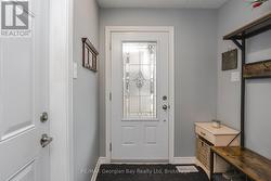 INSIDE ENTRANCE FROM GARAGE - 