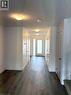 Hall with a textured ceiling and dark wood-style floors - 7 Pin Oak Common, Cambridge, ON  - Indoor Photo Showing Other Room 