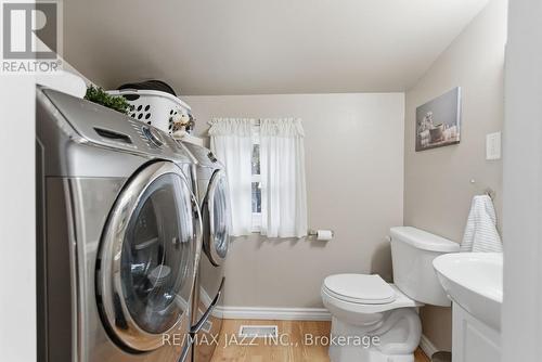 Convenient main floor  powder/laundry room - 148 Conant Street, Oshawa (Lakeview), ON - Indoor Photo Showing Laundry Room