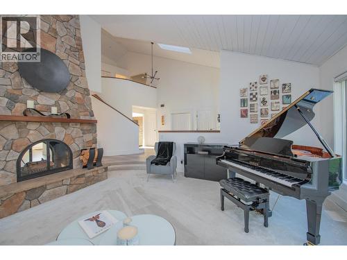 702 Cypress Drive, Coldstream, BC - Indoor Photo Showing Living Room With Fireplace