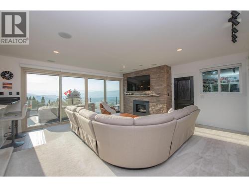 702 Cypress Drive, Coldstream, BC - Indoor Photo Showing Living Room With Fireplace