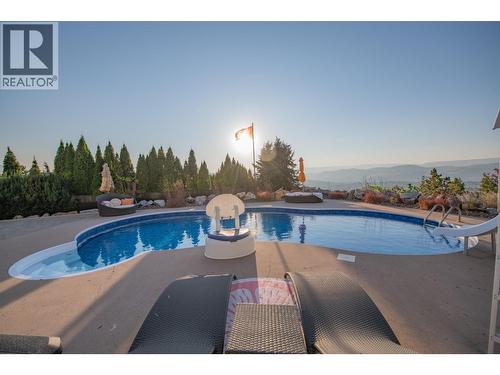 702 Cypress Drive, Coldstream, BC - Outdoor With In Ground Pool