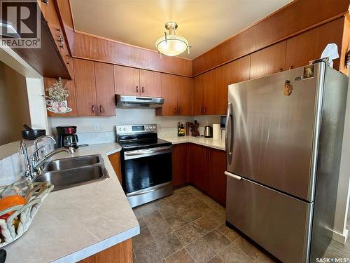 518 Upland Drive, Regina, SK - Indoor Photo Showing Kitchen With Double Sink