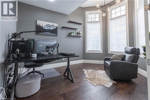 Office space featuring dark wood finished floors and baseboards - 2719 Torrey Pines Way, London, ON - Indoor