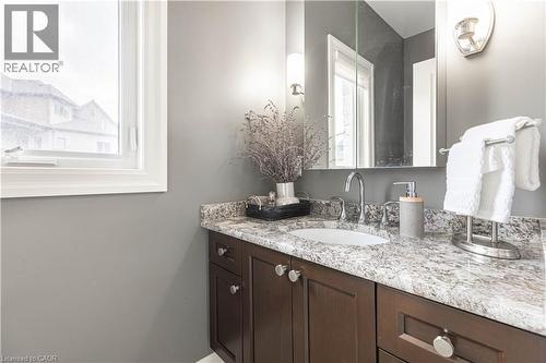 Bathroom featuring vanity and healthy amount of natural light - 2719 Torrey Pines Way, London, ON - Indoor Photo Showing Bathroom