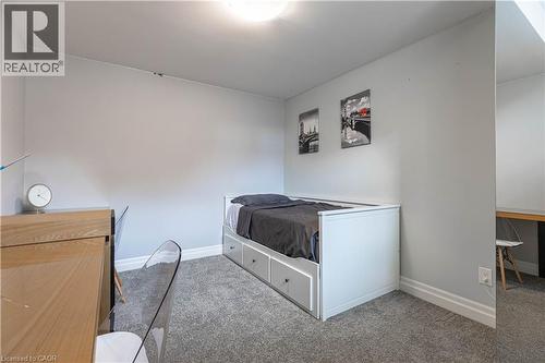 Bedroom featuring light carpet and baseboards - 2719 Torrey Pines Way, London, ON - Indoor