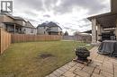 Fenced backyard with a patio, an outdoor fire pit, and a residential view - 2719 Torrey Pines Way, London, ON  - Outdoor With Deck Patio Veranda 