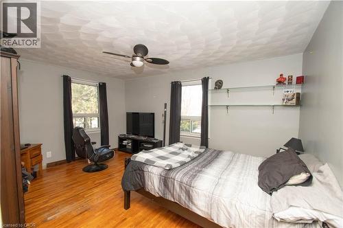 Bedroom with light wood finished floors and a ceiling fan - 535 Mcdowell Road E, Simcoe, ON - Indoor Photo Showing Bedroom