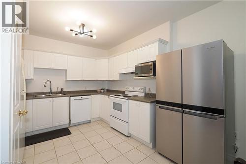255 Keats Way Unit# 701, Waterloo, ON - Indoor Photo Showing Kitchen With Double Sink