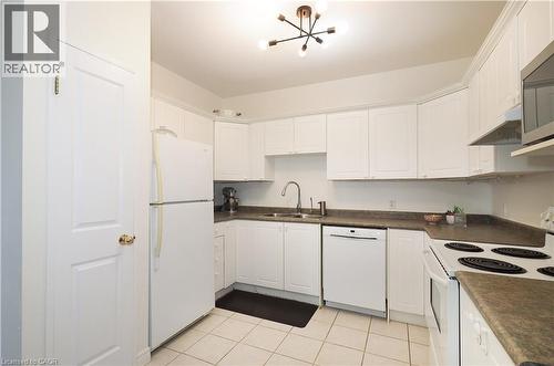 255 Keats Way Unit# 701, Waterloo, ON - Indoor Photo Showing Kitchen With Double Sink