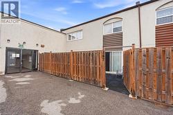 Rear view of house with stucco siding - 