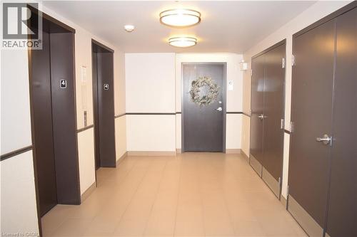 Hallway with elevator - 776 Laurelwood Drive Unit# 406, Waterloo, ON - Indoor Photo Showing Other Room