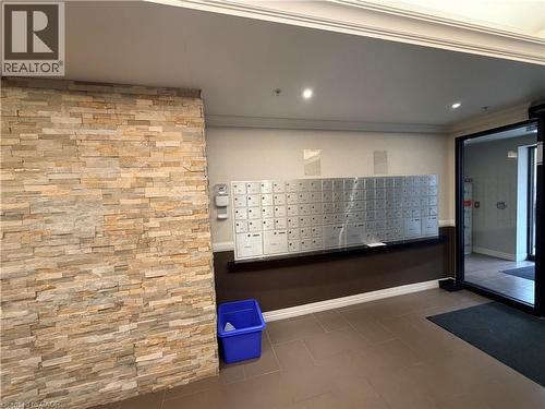View of property's community with mail area - 776 Laurelwood Drive Unit# 406, Waterloo, ON - Indoor Photo Showing Other Room