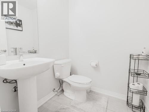Bathroom featuring light tile patterned floors - 1206 Main Street E Unit# 113, Milton, ON - Indoor Photo Showing Bathroom