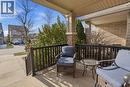 Sit back and enjoy the friendly neighbourhood atmosphere. - 26 Helena Feasby Street, Kitchener, ON  - Outdoor With Deck Patio Veranda With Exterior 